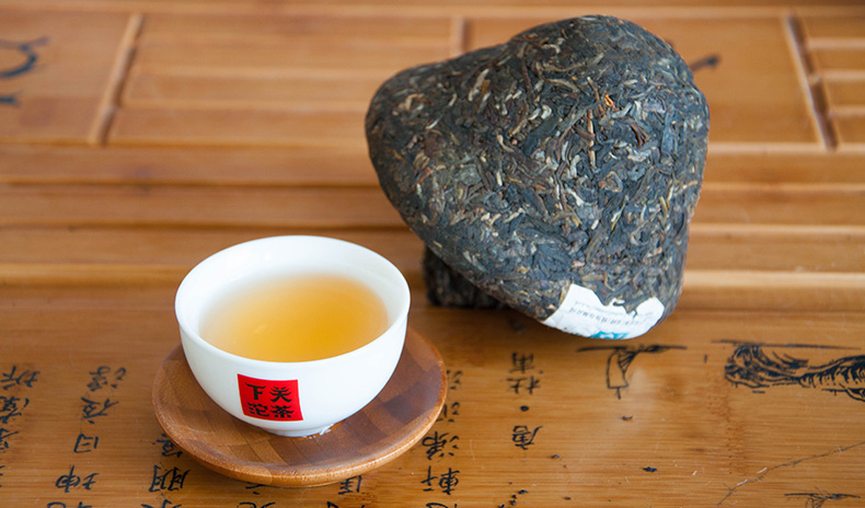 Властивості чаю Шен Пуэр Ся Гуань «Цин Синь» Гриб 2015 год